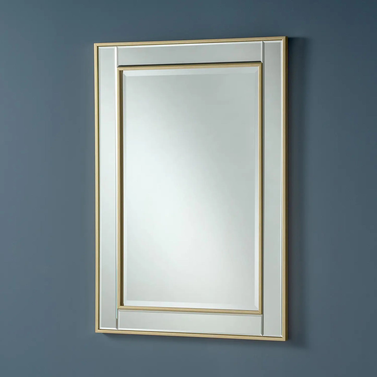 Gold-framed rectangular wall mirror with beveled edges.