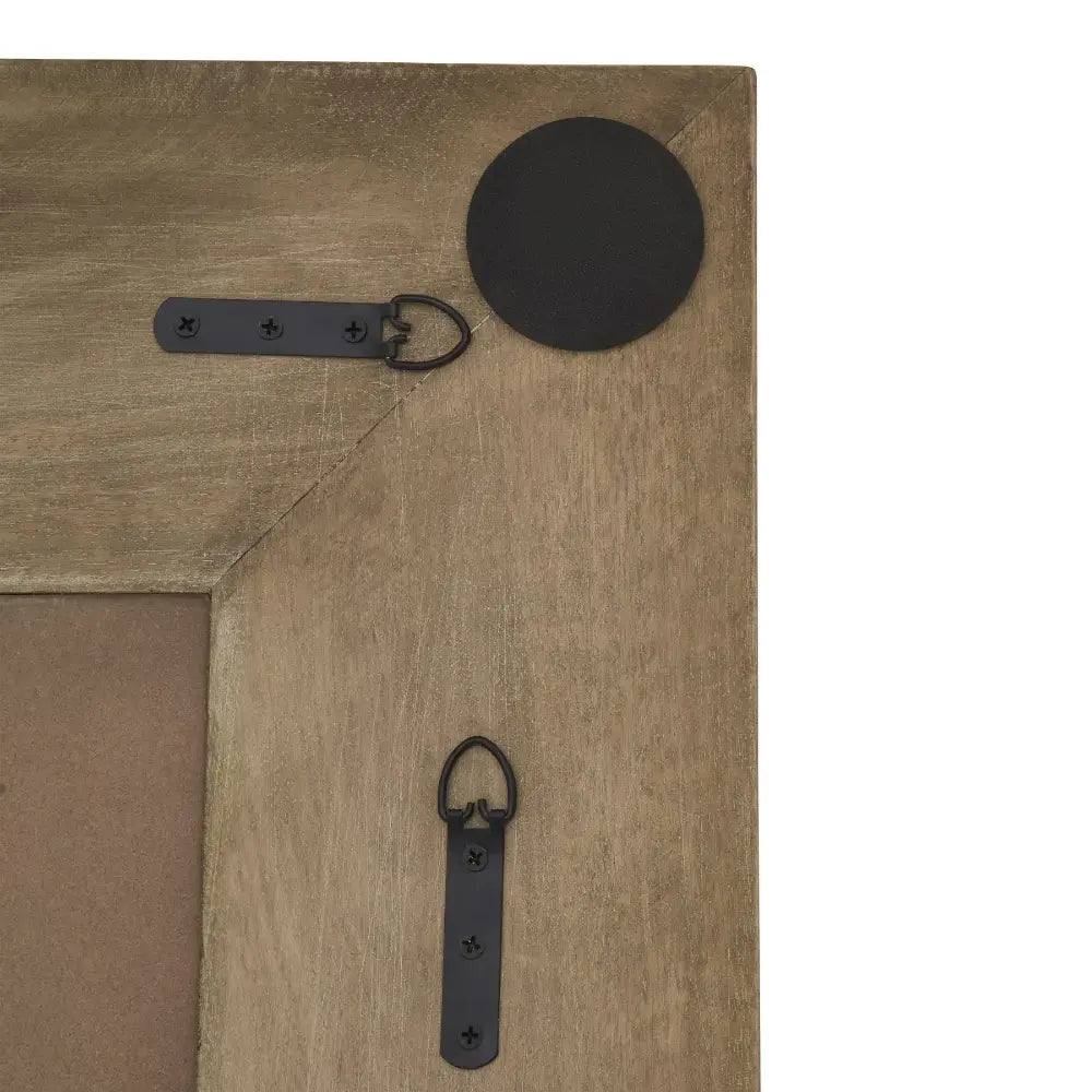 Wooden mirror frame corner with fixings for both portrait and landscape orientation.
